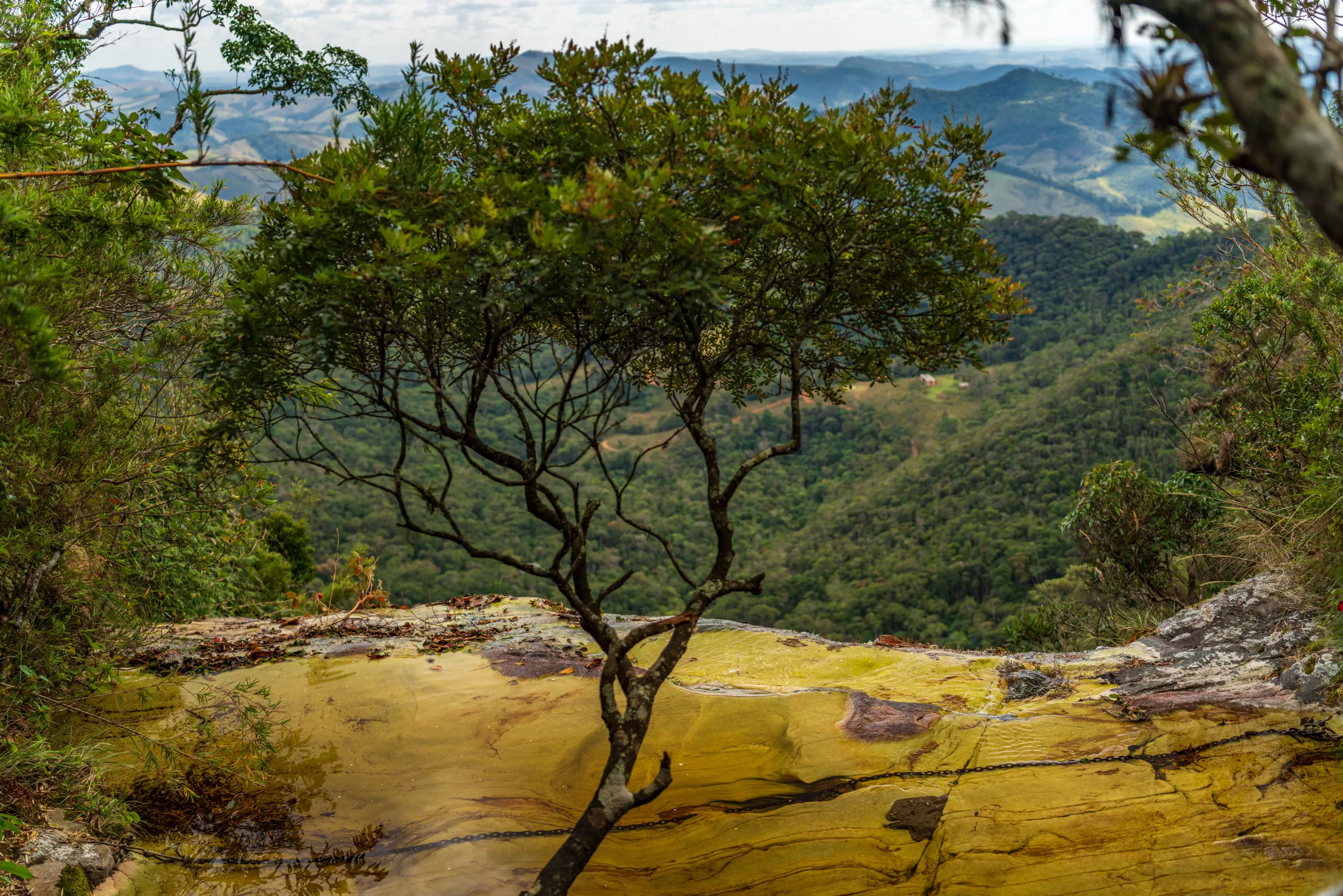 A stunning waterfall plunges from a cliff named Janela de Ceu in Brazil into a deep abyss.